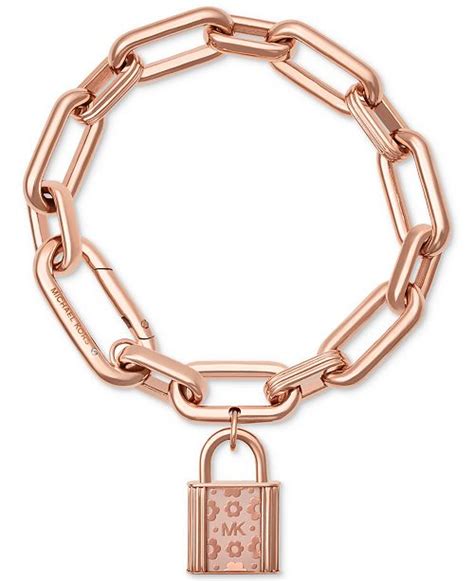 Michael Kors chain link padlock bracelet in a rose gold tone.